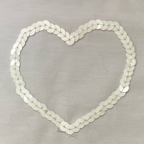 NWOT white onesie, bodysuit, size 3-5, poly blend, sequin heart detail at front, - Picture 5 of 7